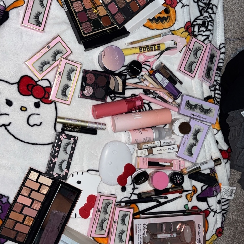 Too Faced Makeup Collection with Pink and Black Accents